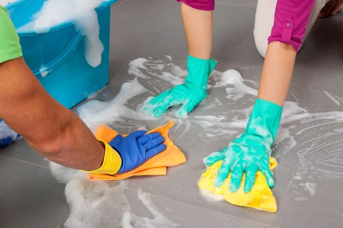 Carpet cleaning team preparing a safe work area