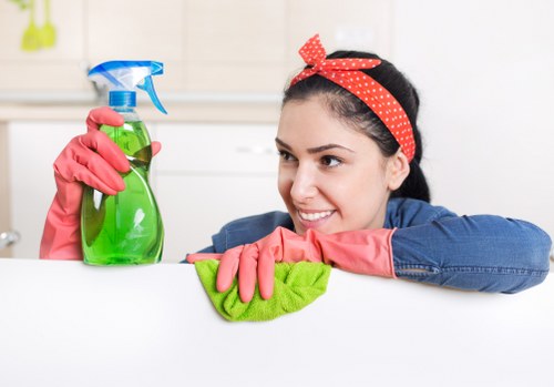 Office cleaner maintaining a commercial workspace in SE24